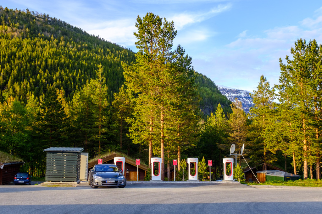 Charge your Tesla and climb he peak in the back for double karma